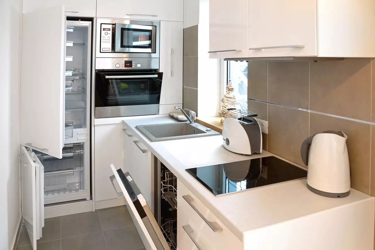 White kitchen full of appliances 