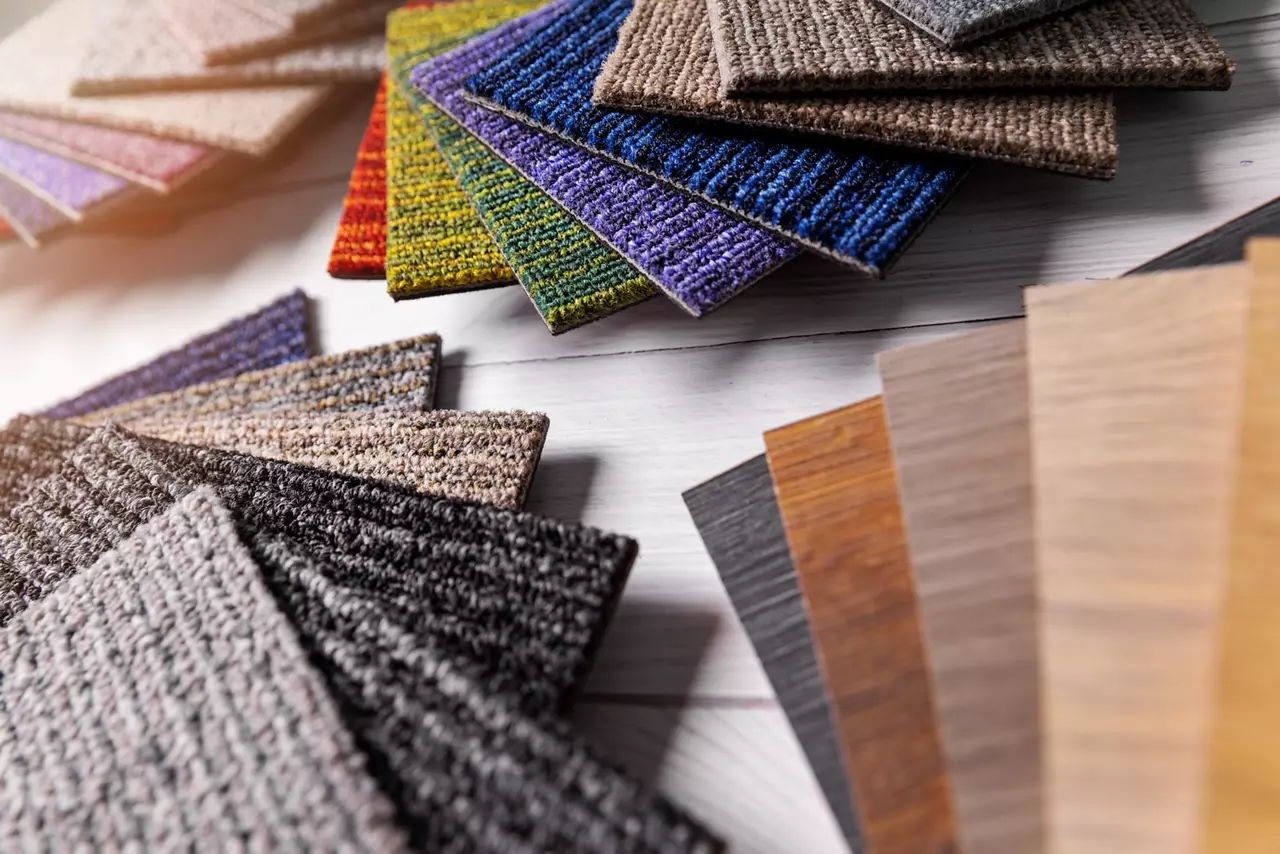 flooring and furniture materials - floor carpet and wooden laminate samples