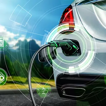 EV charging station for electric car in concept of alternative green energy produced from sustainable resources to supply to charger station in order to reduce CO2 emission .