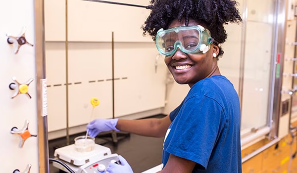 Beyond Benign participant working in the lab