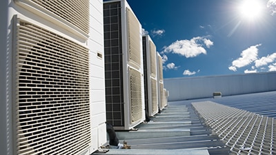 HVAC systems with sunny sky in the background